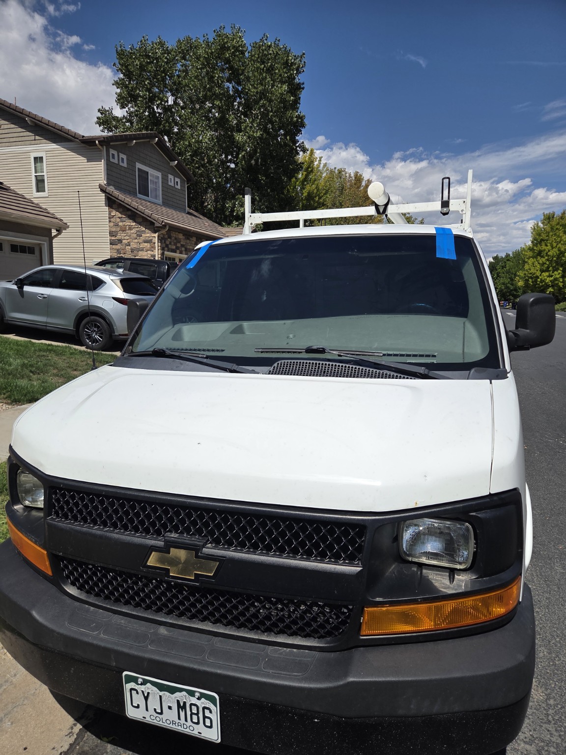 Auto glass service on Chevrolet van
